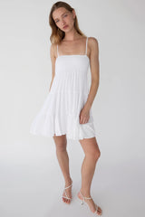 SMOCKED TIERED MINI DRESS